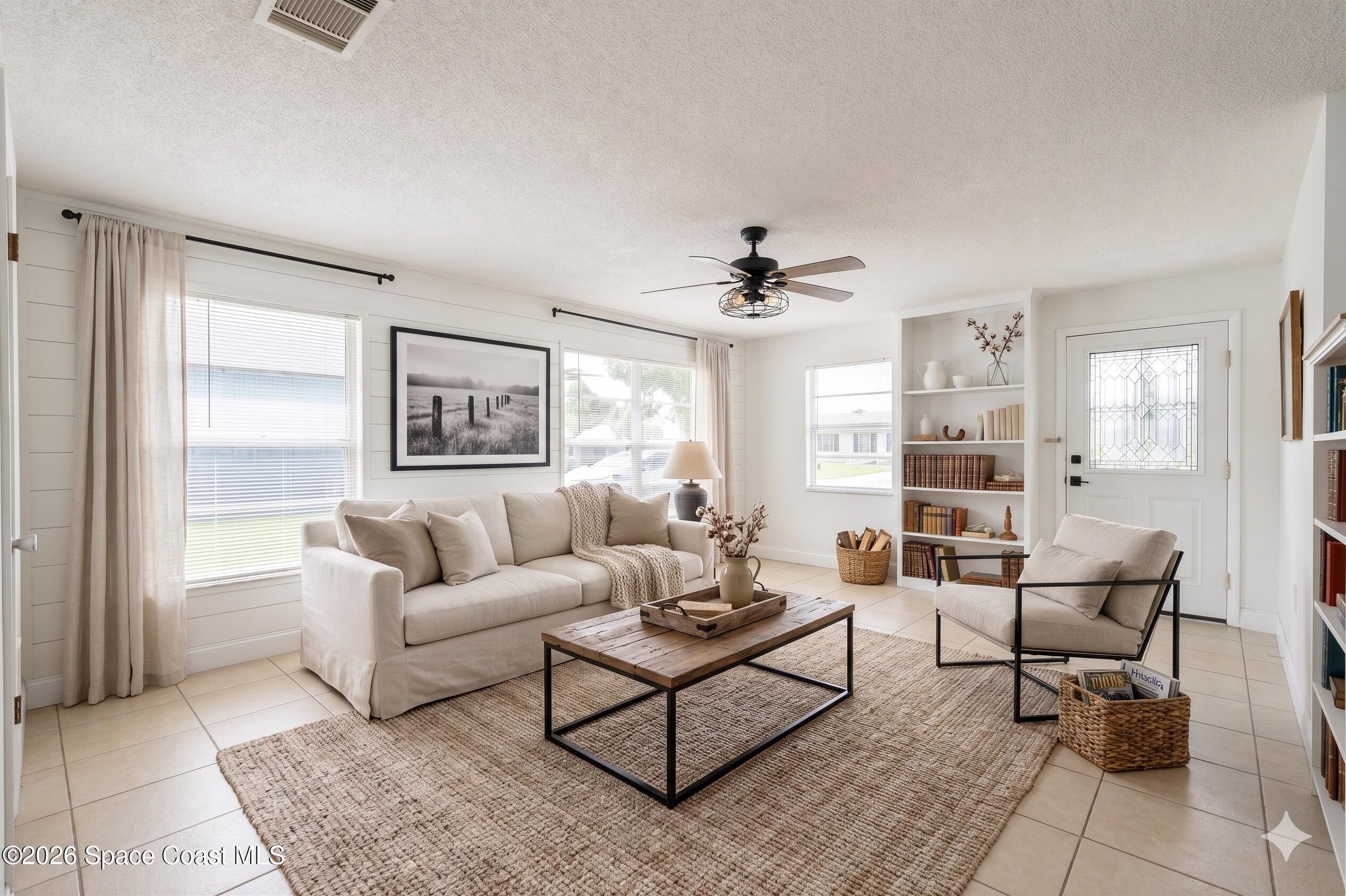 2882 Pembroke Road Melbourne, FL 32935 - Photo 4 of 26 5-Family Room Transformed