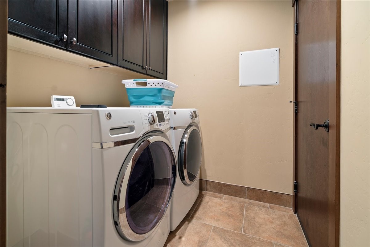 853 Independence Road, Unit 853 Keystone, CO 80435 - Photo 21 of 37 a utility room with dryer and washer