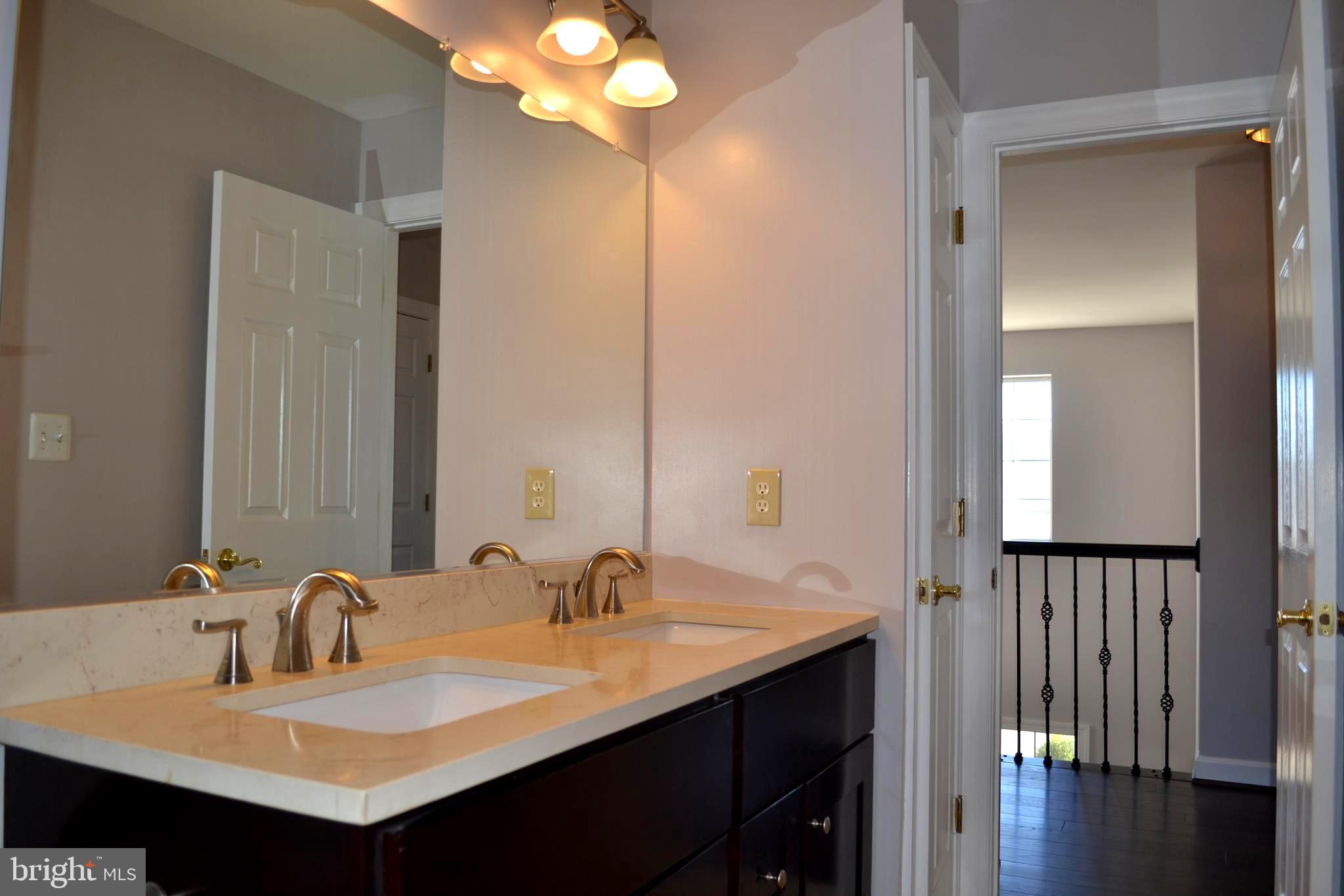 2048 Madrillon Road Vienna, VA 22182 - Photo 39 of 56 Hallway Full Bathroom