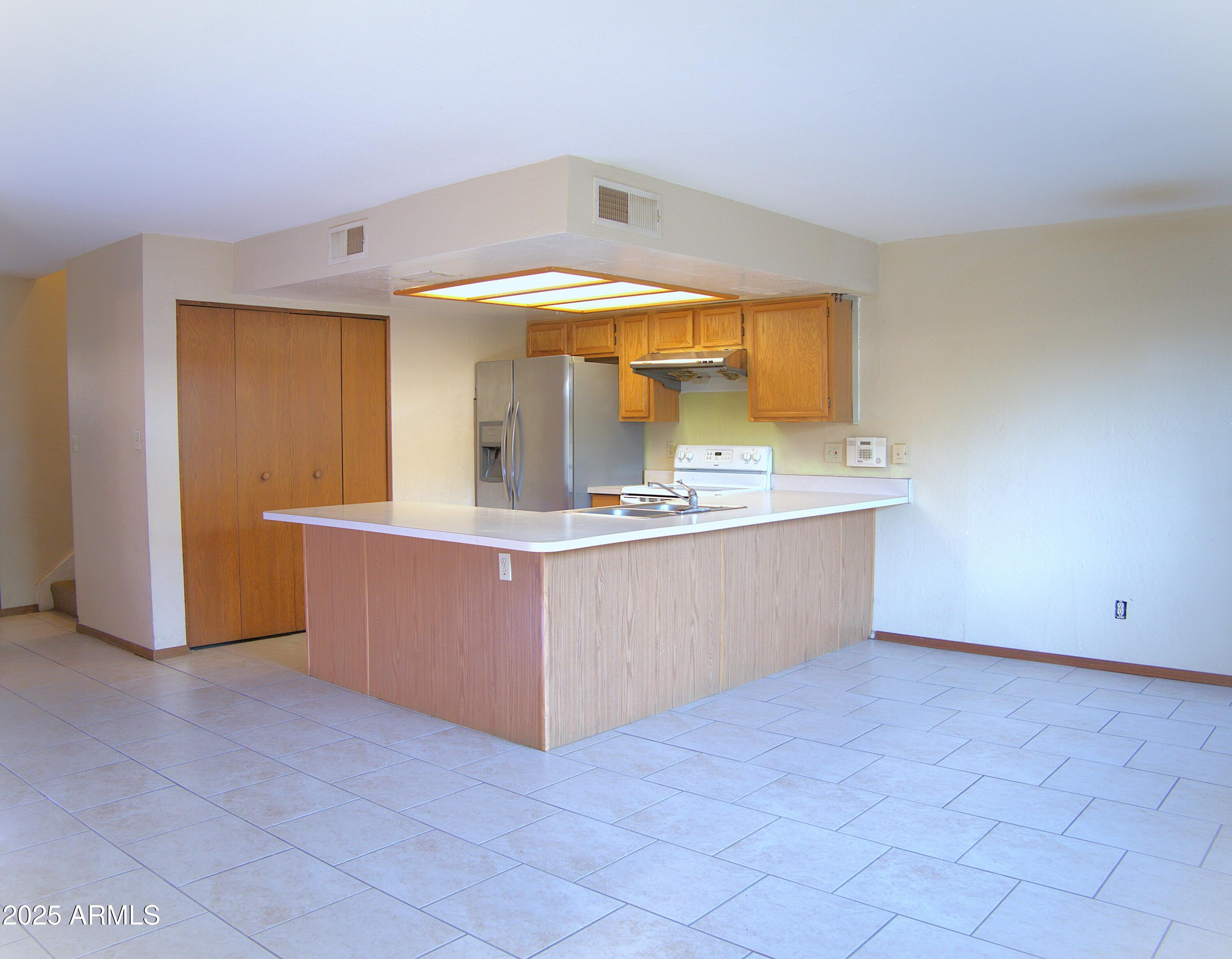 2021 East Osborn Road, Unit 5 Phoenix, AZ 85016 - Photo 3 of 10 Kitchen Angle