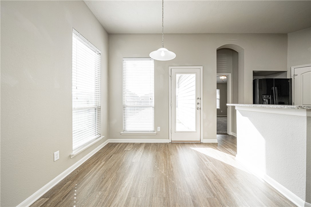 3009 Positano Loop Bryan, TX 77808 - Photo 11 of 21 wooden floor with a window in a room