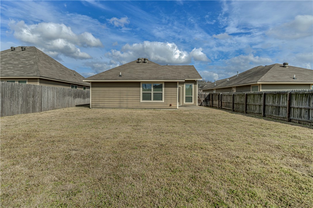 3009 Positano Loop Bryan, TX 77808 - Photo 21 of 21 front view of a house with a yard