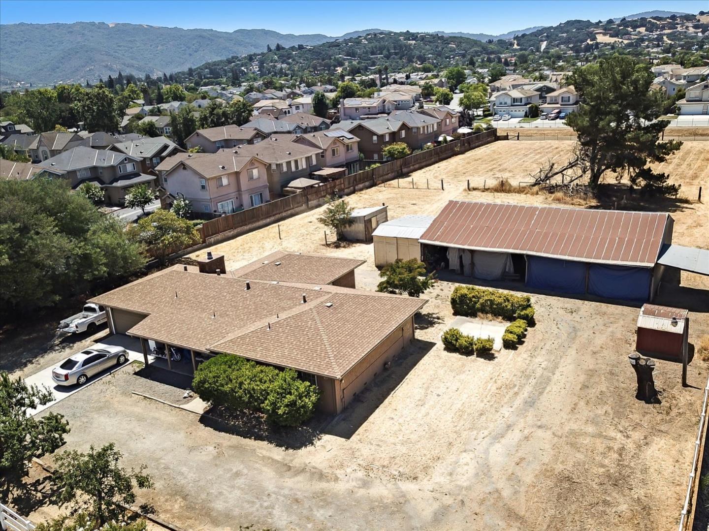 9045 Kern Avenue Gilroy, CA 95020 - Photo 3 of 14 an aerial view of a house with a yard