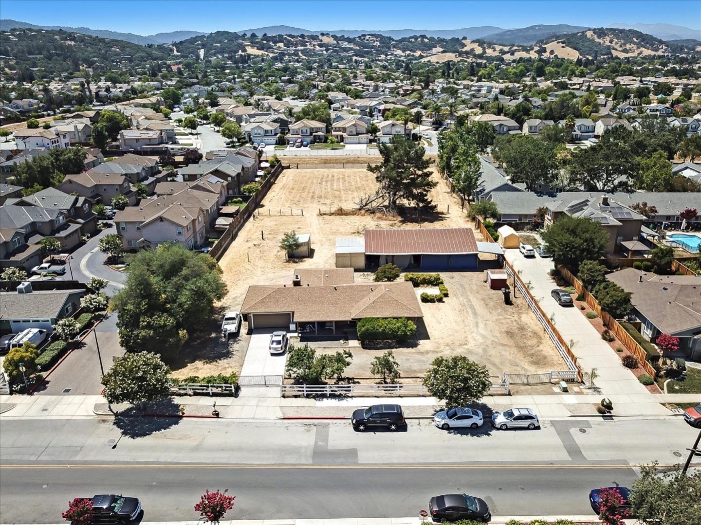 9045 Kern Avenue Gilroy, CA 95020 - Photo 8 of 14 an aerial view of residential houses with outdoor space