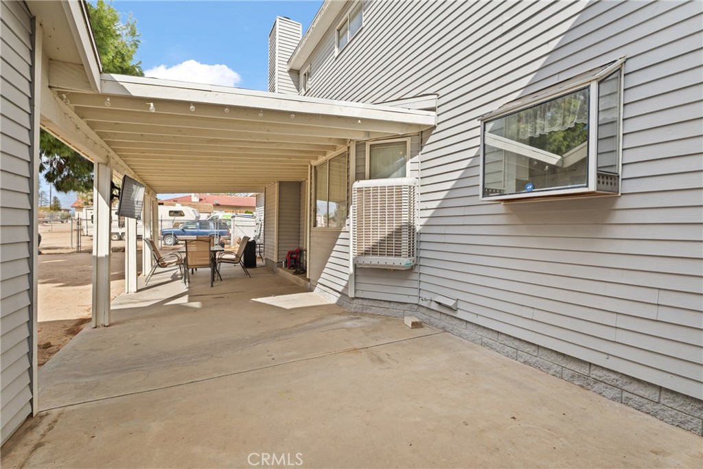 14610 Apple Valley Road Apple Valley, CA 92307 - Photo 41 of 49 a view of a house with porch
