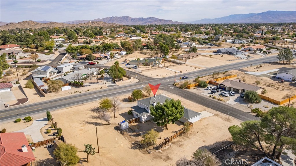 14610 Apple Valley Road Apple Valley, CA 92307 - Photo 49 of 49 an aerial view of residential houses with outdoor space