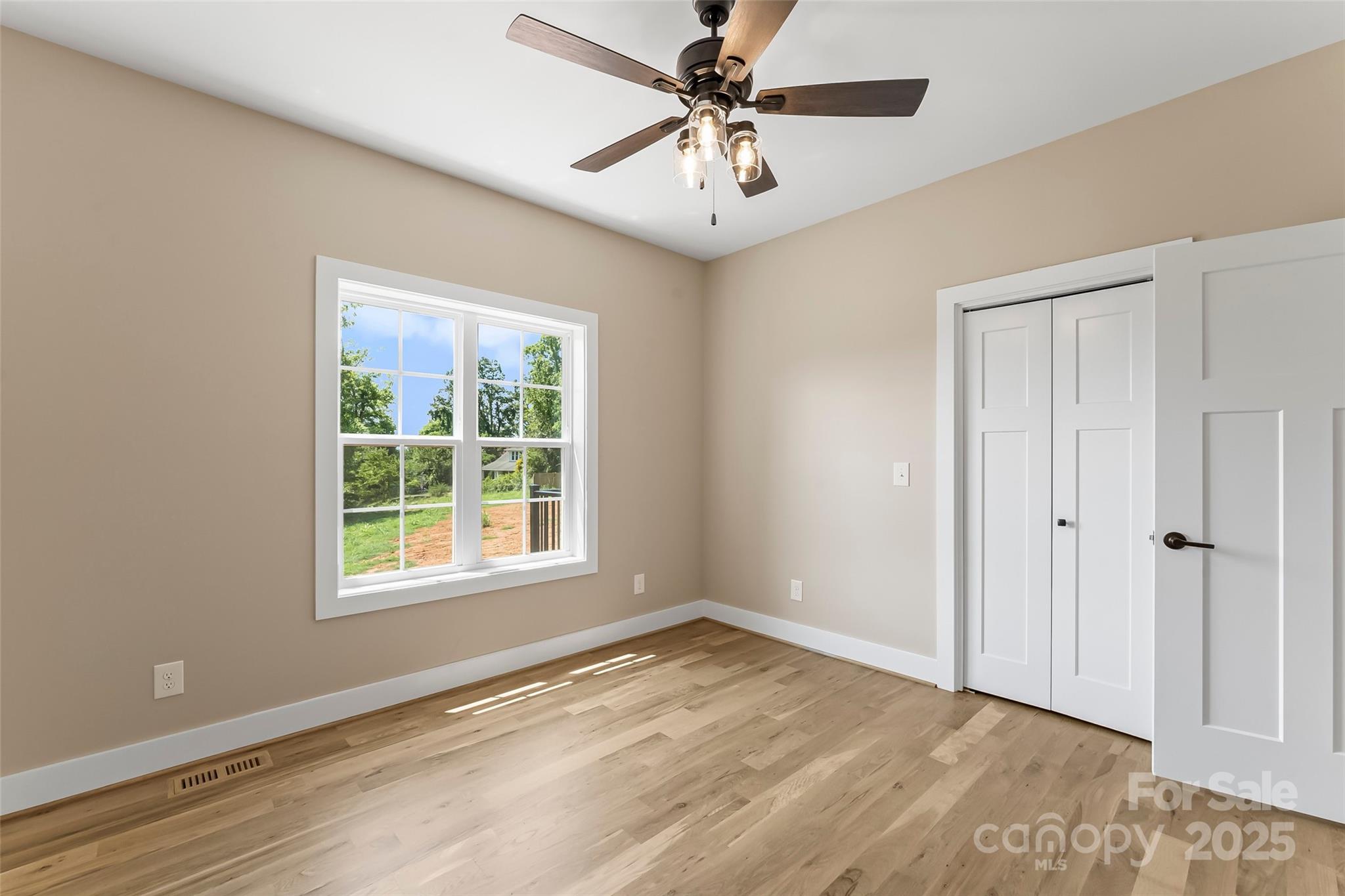 2937 Frank Whisnant Road Morganton, NC 28655 - Photo 11 of 25 a view of an empty room with a window