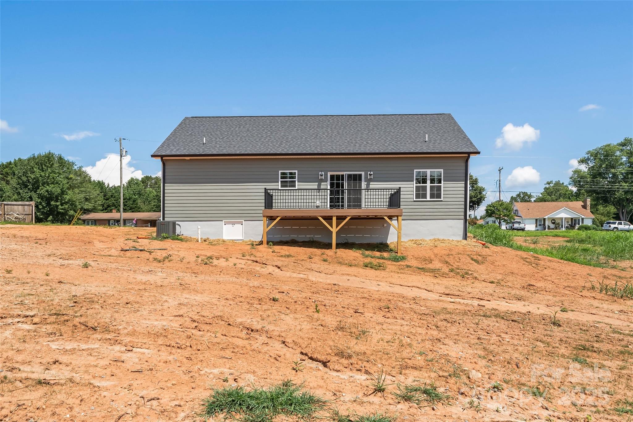 2937 Frank Whisnant Road Morganton, NC 28655 - Photo 20 of 25 a front view of a house with a yard