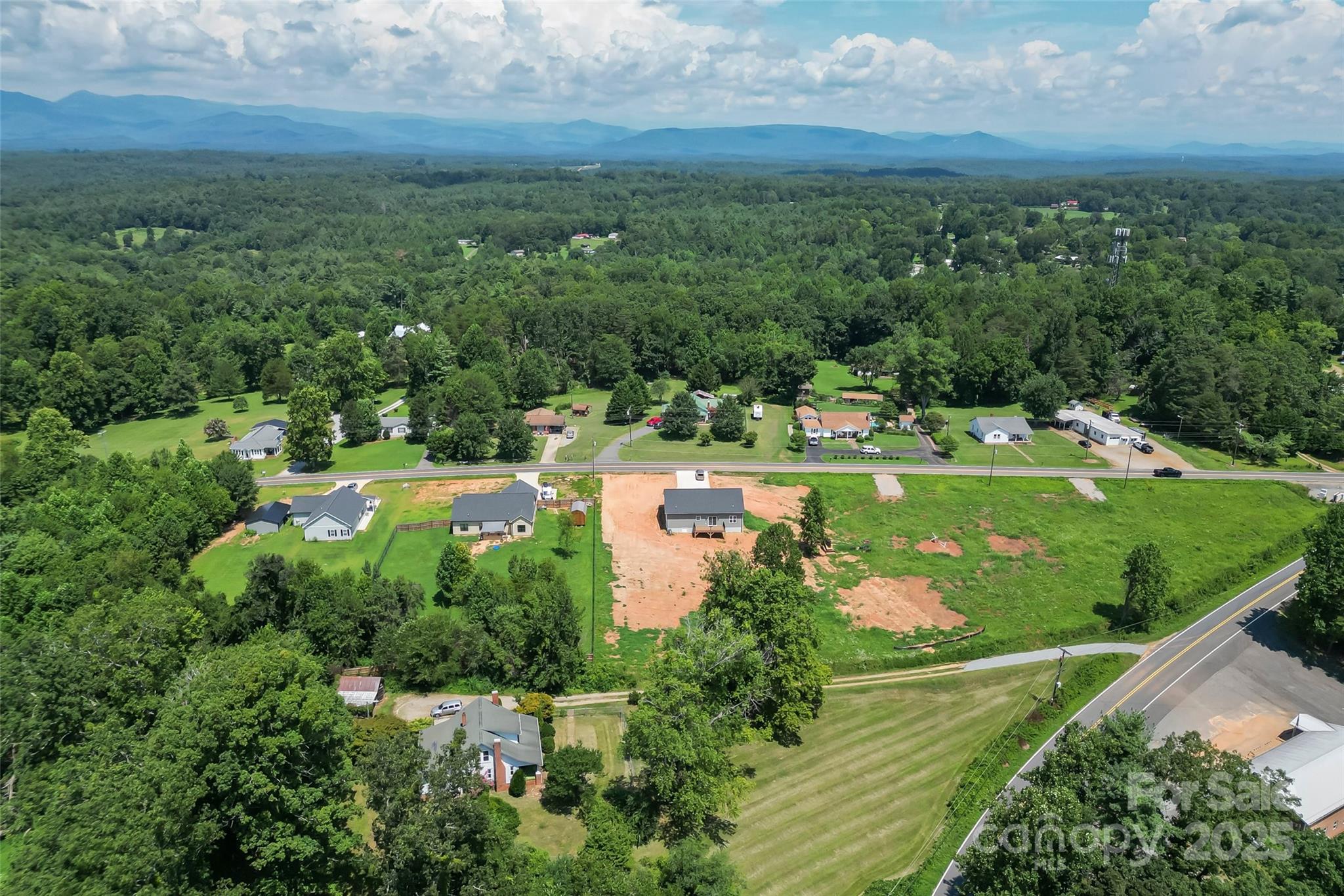 2937 Frank Whisnant Road Morganton, NC 28655 - Photo 4 of 25 an aerial view of residential houses with outdoor space and trees