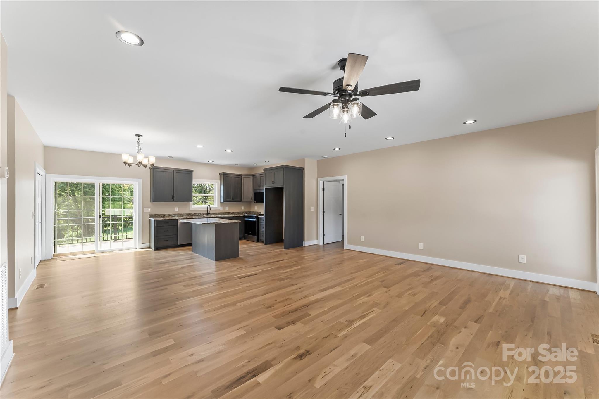 2937 Frank Whisnant Road Morganton, NC 28655 - Photo 7 of 25 a view of a kitchen with a sink and a window