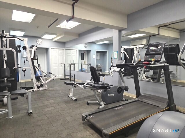 839 Main Street, Unit 91 Torrington, CT 06790 - Photo 14 of 14 a view of a room with gym equipment