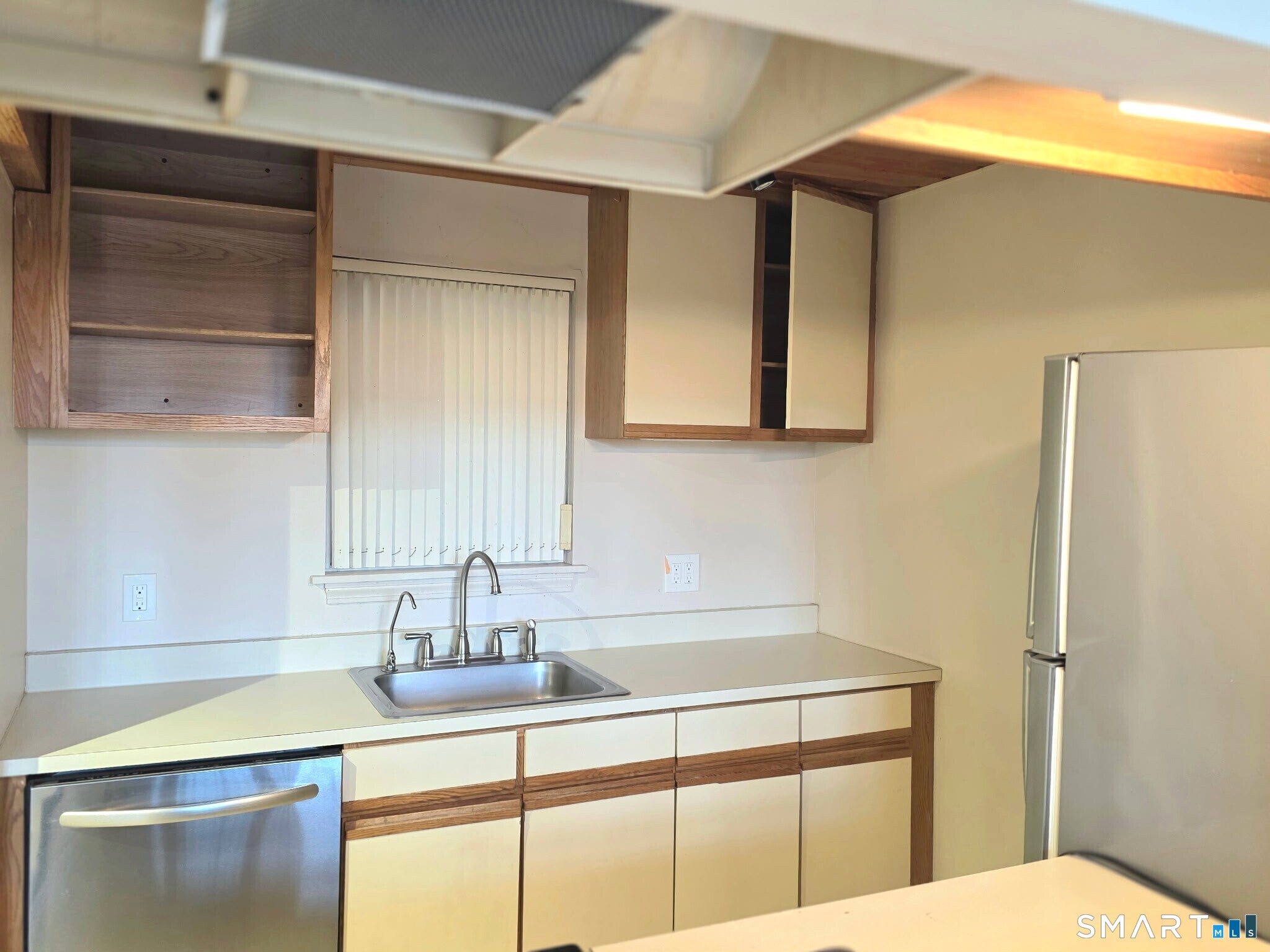 839 Main Street, Unit 91 Torrington, CT 06790 - Photo 6 of 14 a bathroom with a sink and a mirror