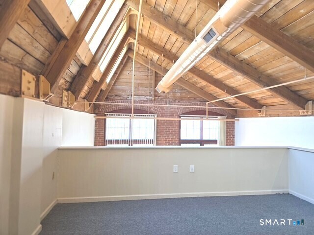 839 Main Street, Unit 91 Torrington, CT 06790 - Photo 10 of 14 a view of a room with a window
