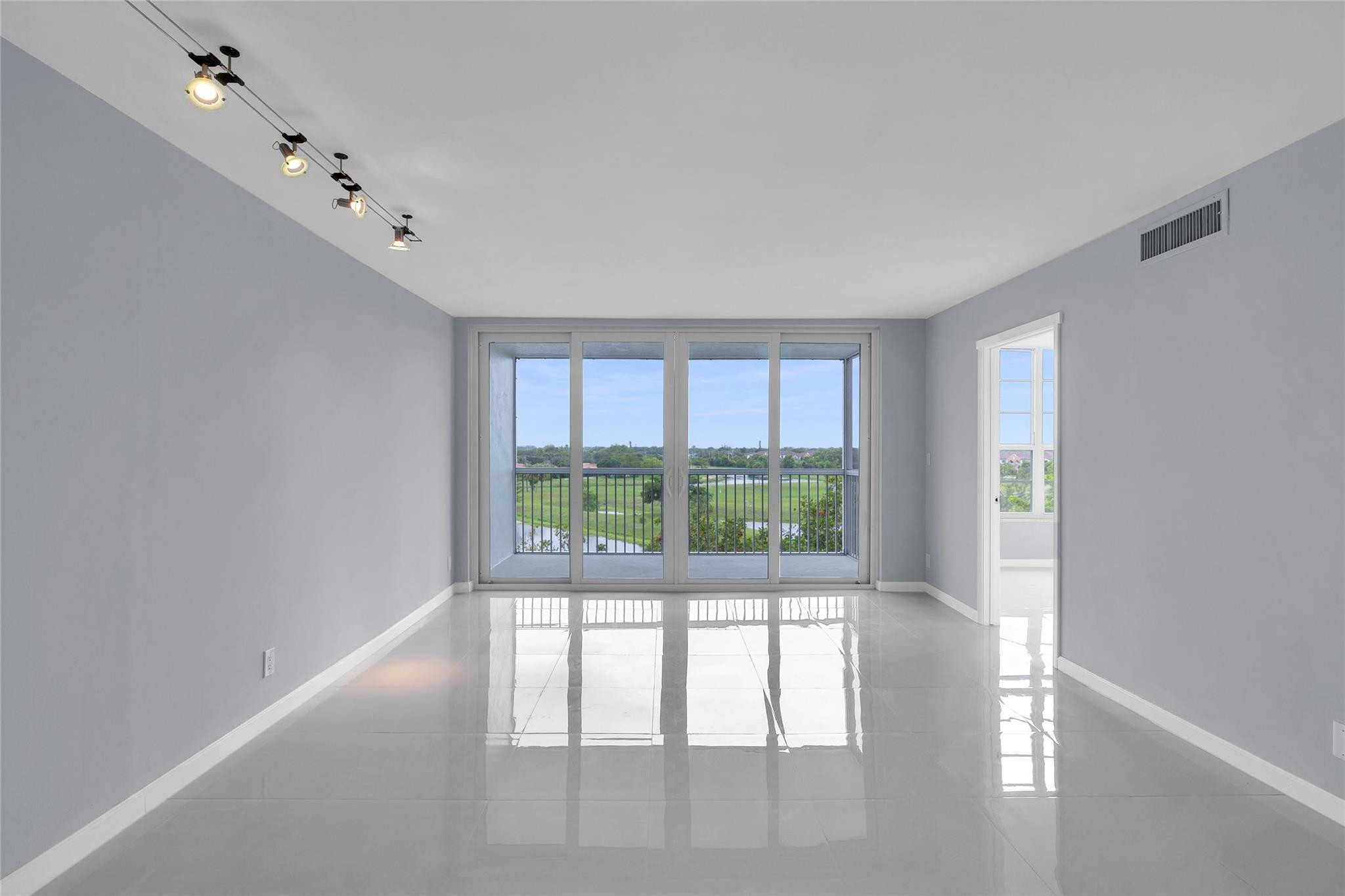 3090 North Course Drive, Unit 609 Pompano Beach, FL 33069 - Photo 16 of 44 a large room with windows and view
