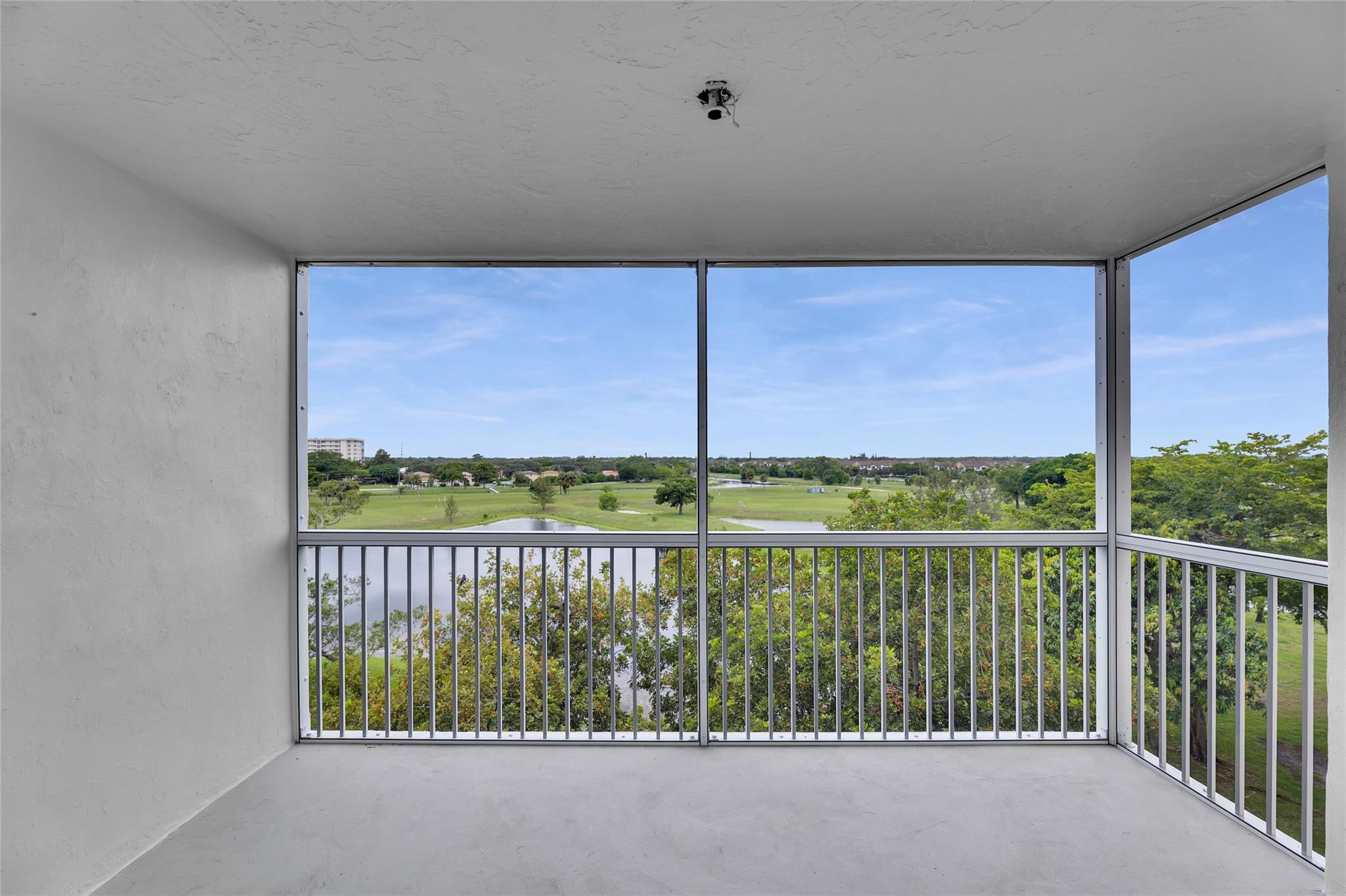 3090 North Course Drive, Unit 609 Pompano Beach, FL 33069 - Photo 18 of 44 a view of a balcony