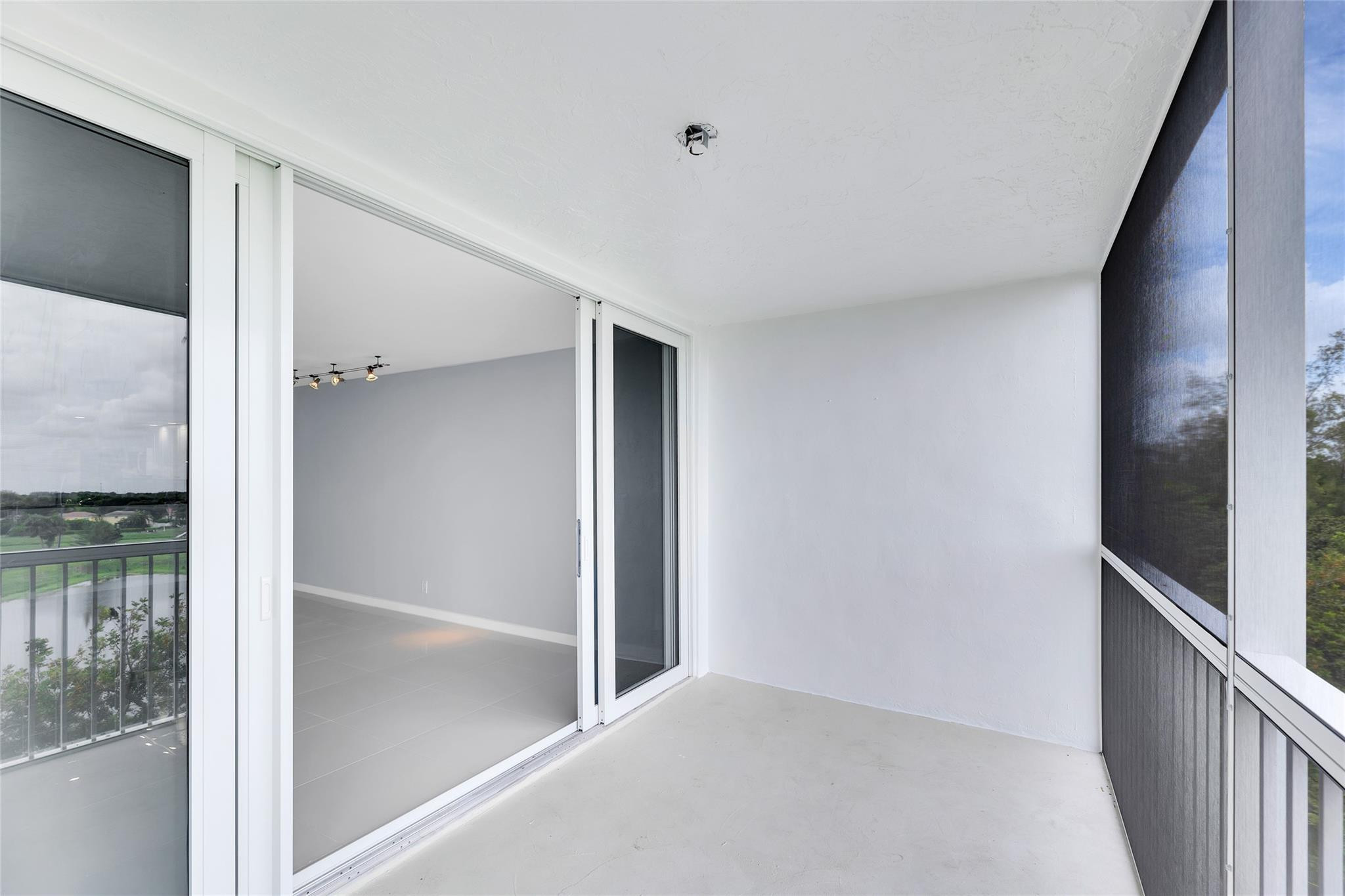3090 North Course Drive, Unit 609 Pompano Beach, FL 33069 - Photo 21 of 44 a view of hallway with closet