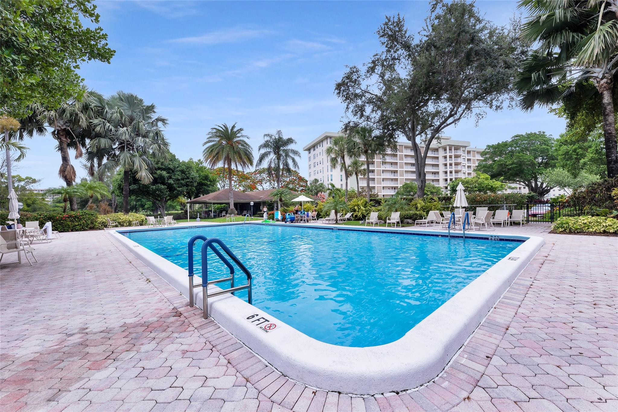 3090 North Course Drive, Unit 609 Pompano Beach, FL 33069 - Photo 35 of 44 a view of swimming pool having outdoor seating