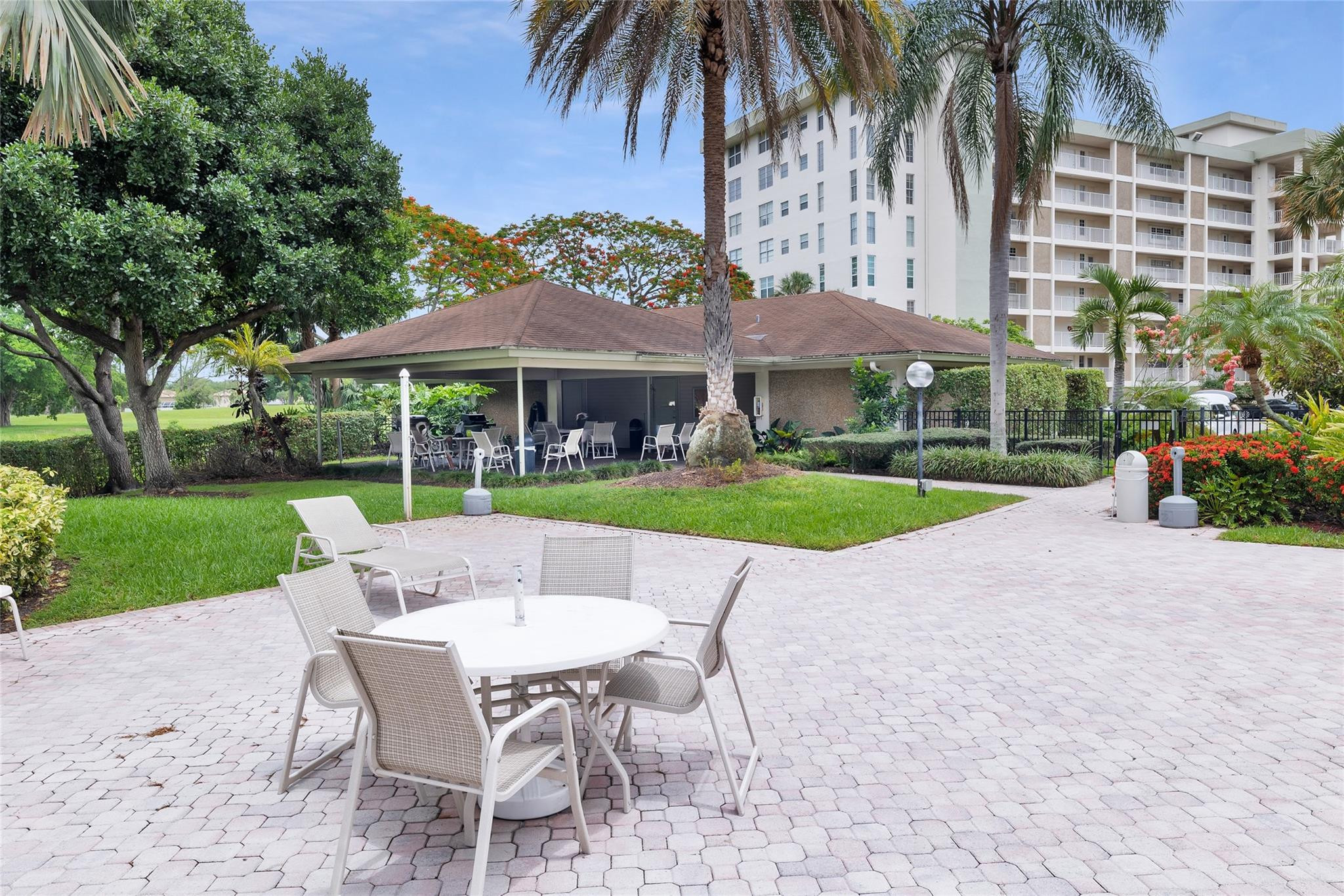 3090 North Course Drive, Unit 609 Pompano Beach, FL 33069 - Photo 36 of 44 a view of outdoor space yard and patio