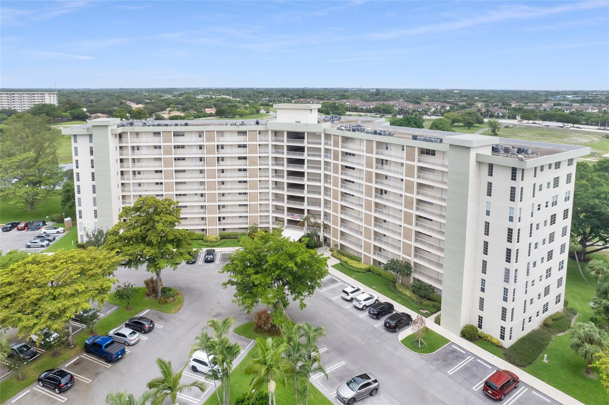 3090 North Course Drive, Unit 609 Pompano Beach, FL 33069 - Photo 41 of 44 a view of a city with tall buildings