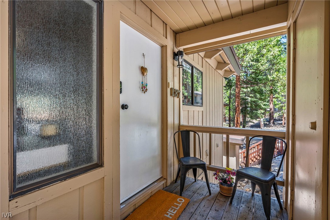 321 Ski Way, Unit 137 Incline Village, NV 89451 - Photo 10 of 21 a view of a balcony with furniture and wooden floor
