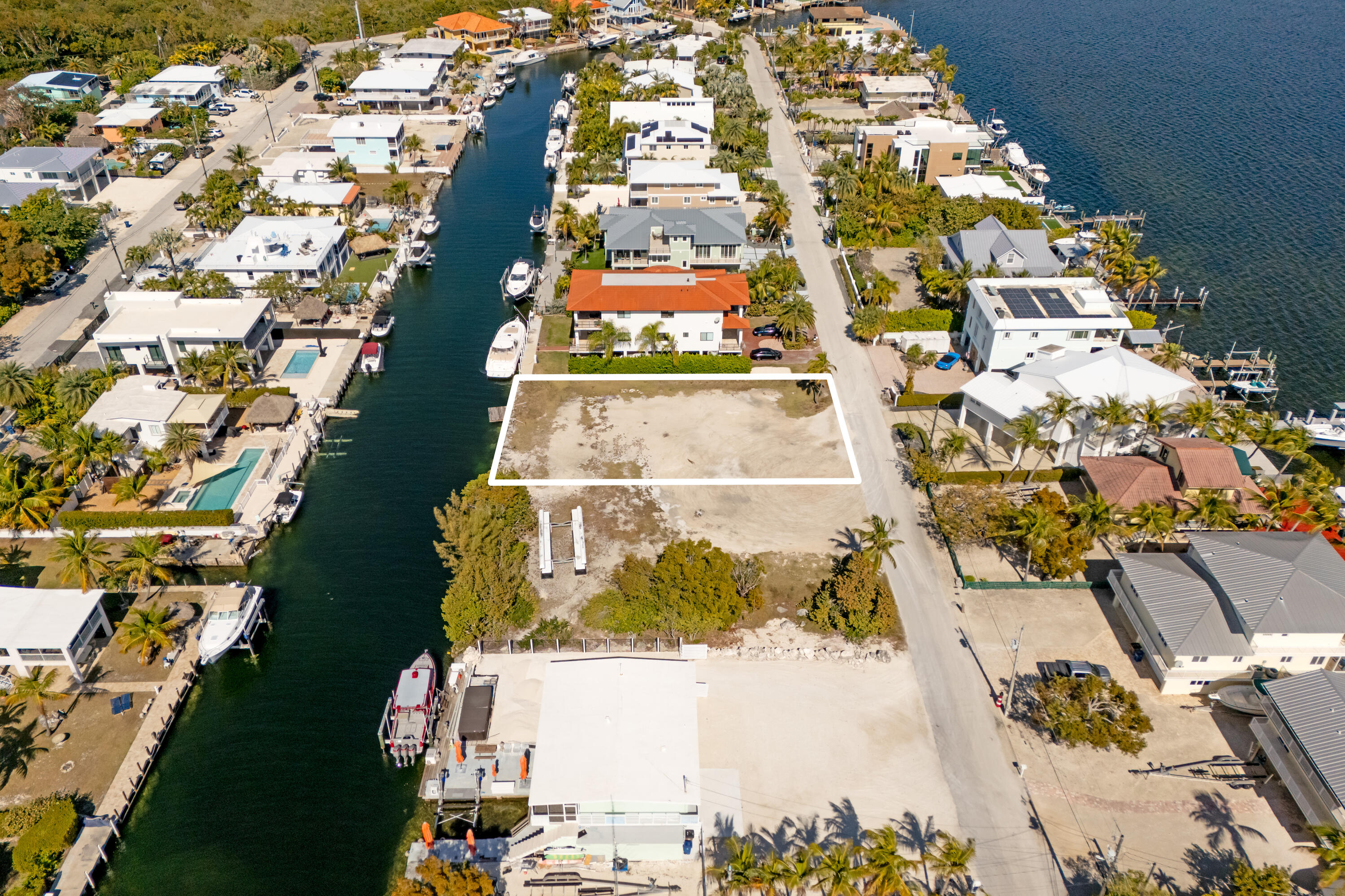 613 Island Drive Key Largo, FL 33037 - Photo 4 of 10 an aerial view of residential houses with outdoor space