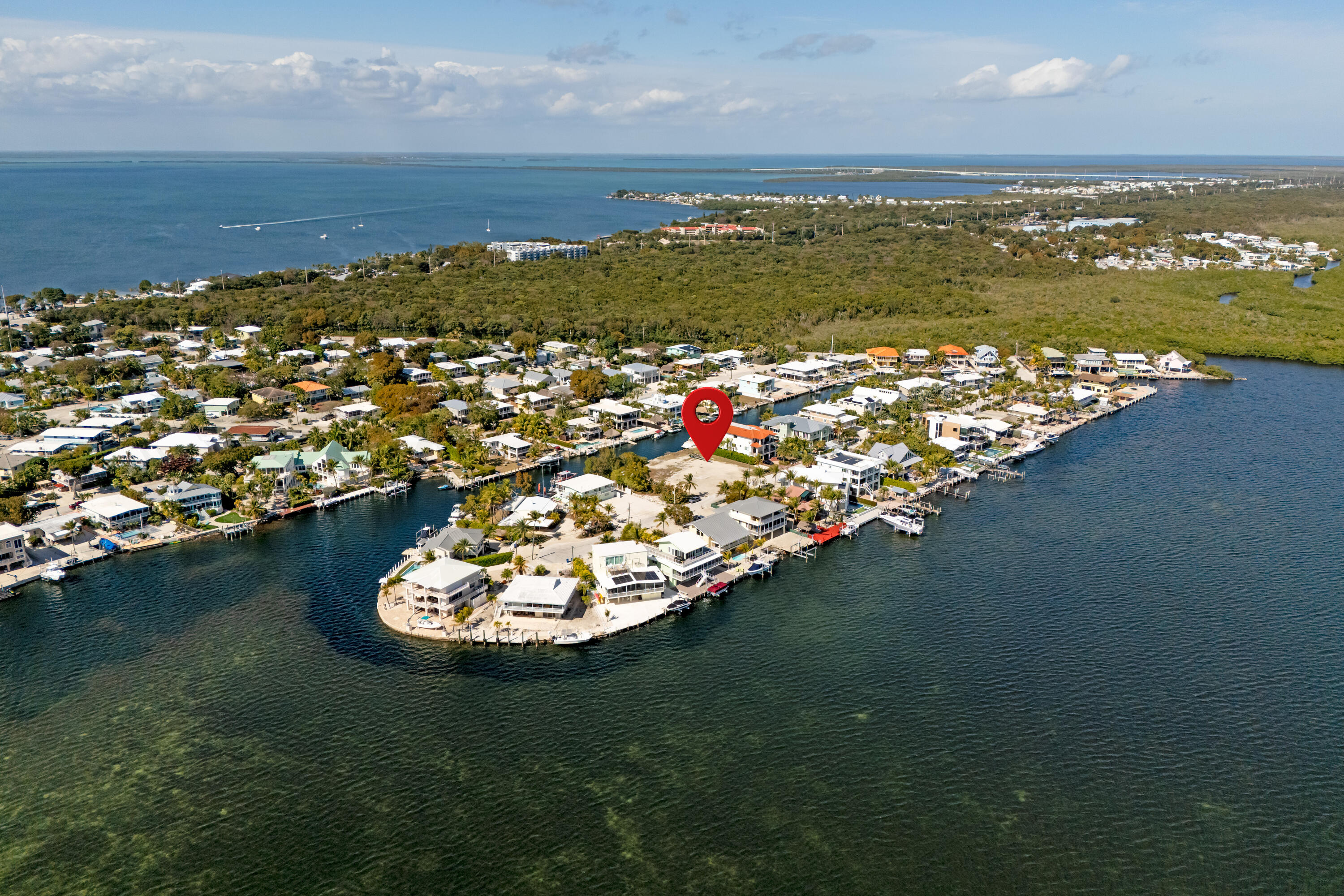 613 Island Drive Key Largo, FL 33037 - Photo 5 of 10 a view of a lake with a mountain