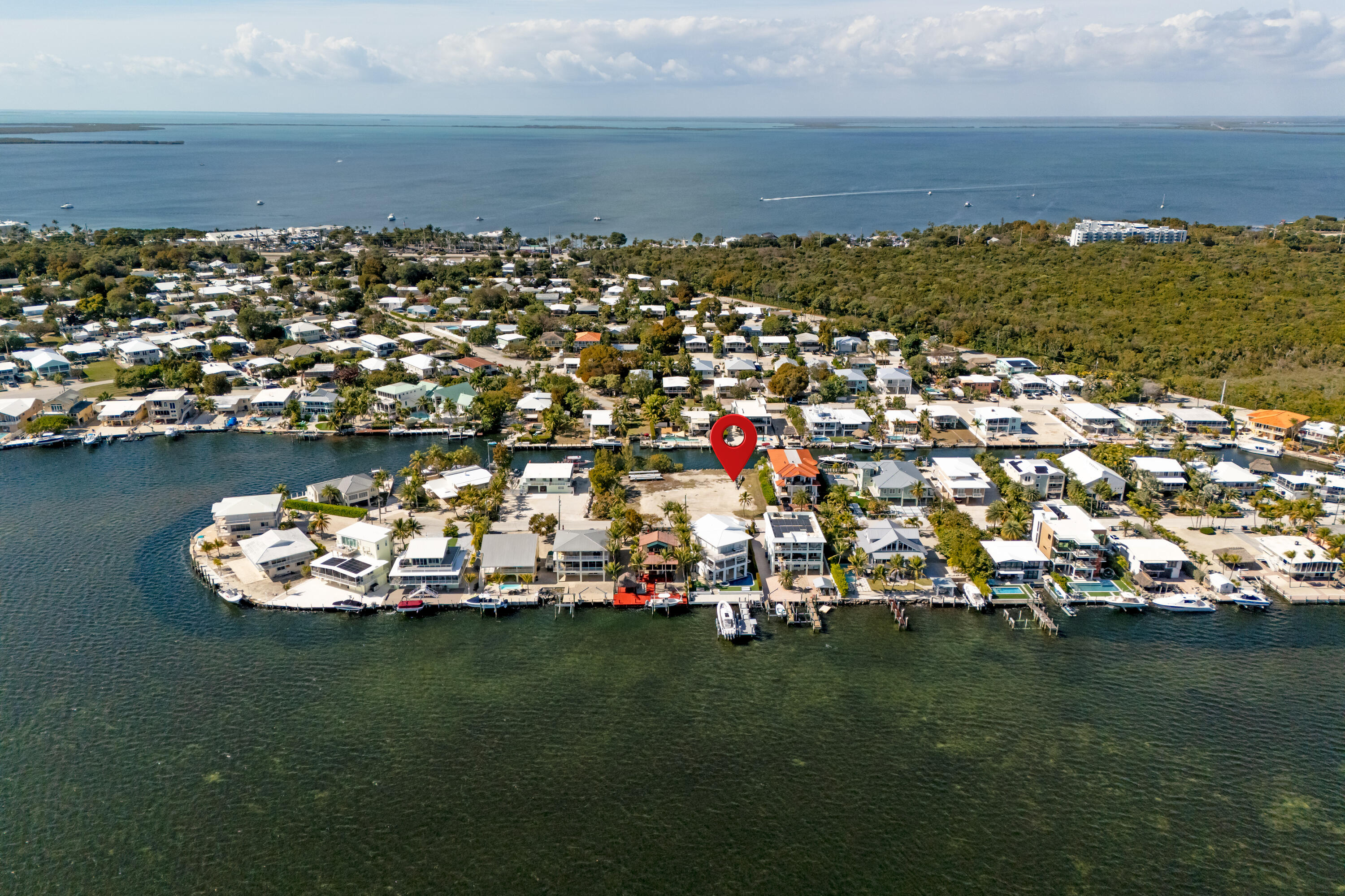 613 Island Drive Key Largo, FL 33037 - Photo 6 of 10 an aerial view of a house with a ocean view