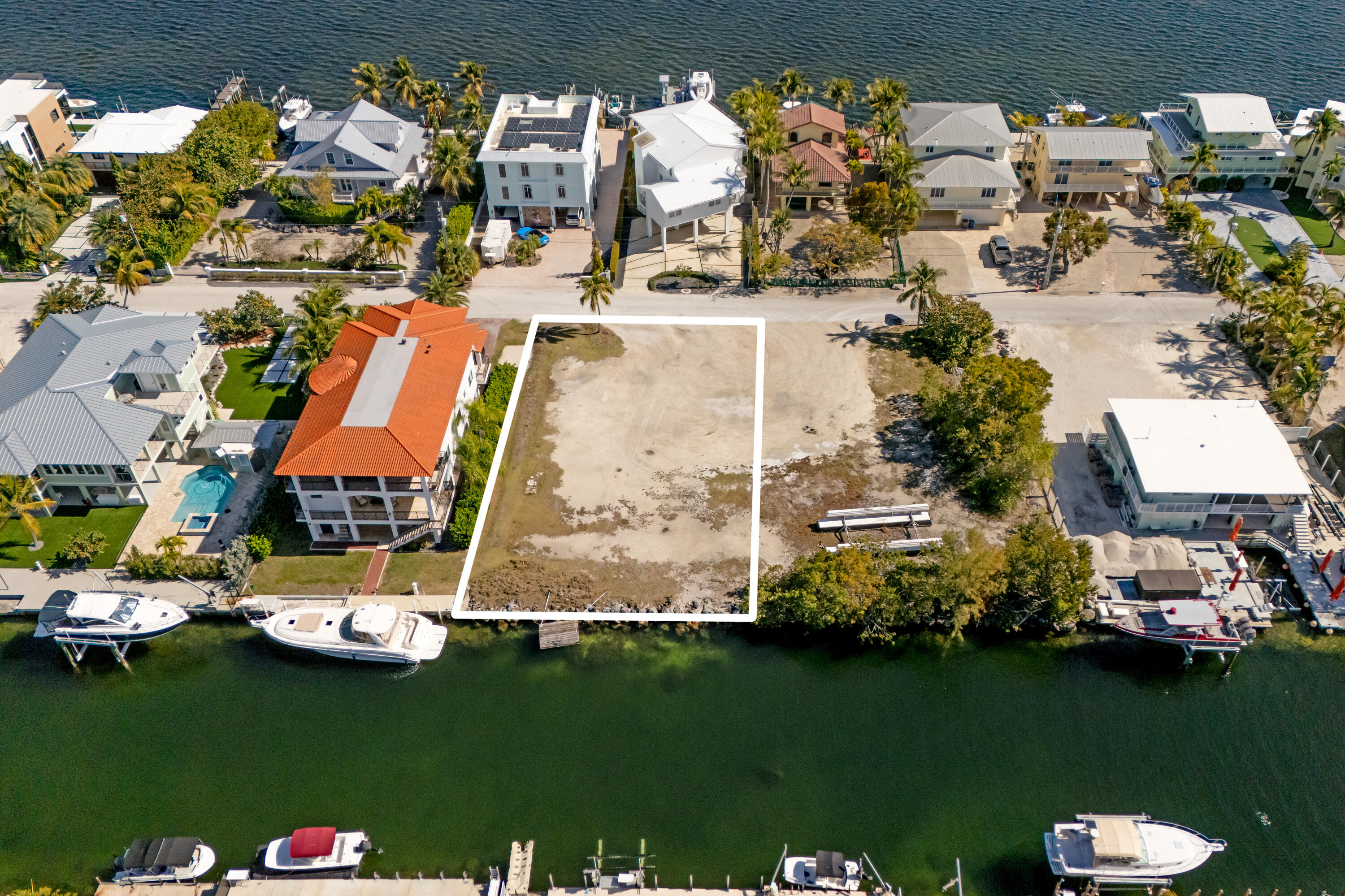613 Island Drive Key Largo, FL 33037 - Photo 8 of 10 an aerial view of residential houses with outdoor space