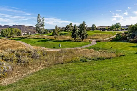 a view of a golf course with a garden
