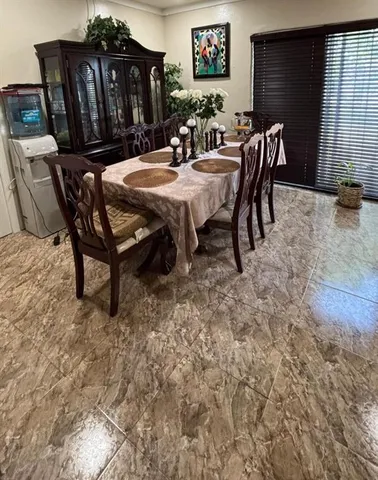 a view of a dining room with furniture