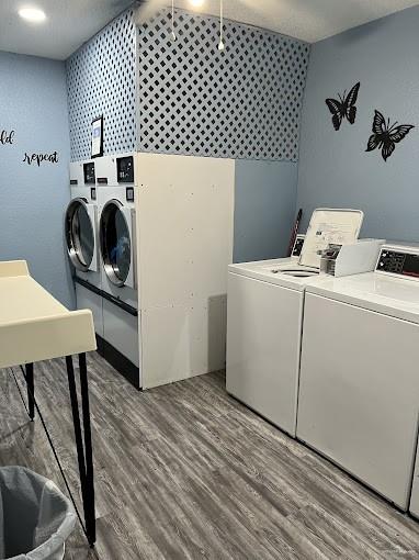 2425 Barnard Road, Unit A15 Brownsville, TX 78520 - Photo 16 of 16 Laundry area featuring washer and clothes dryer and hardwood / wood-style floors