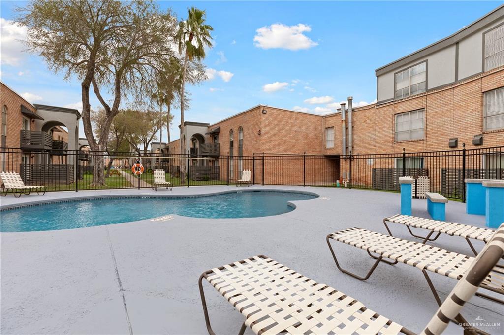 2425 Barnard Road, Unit A15 Brownsville, TX 78520 - Photo 2 of 16 View of pool with a patio area