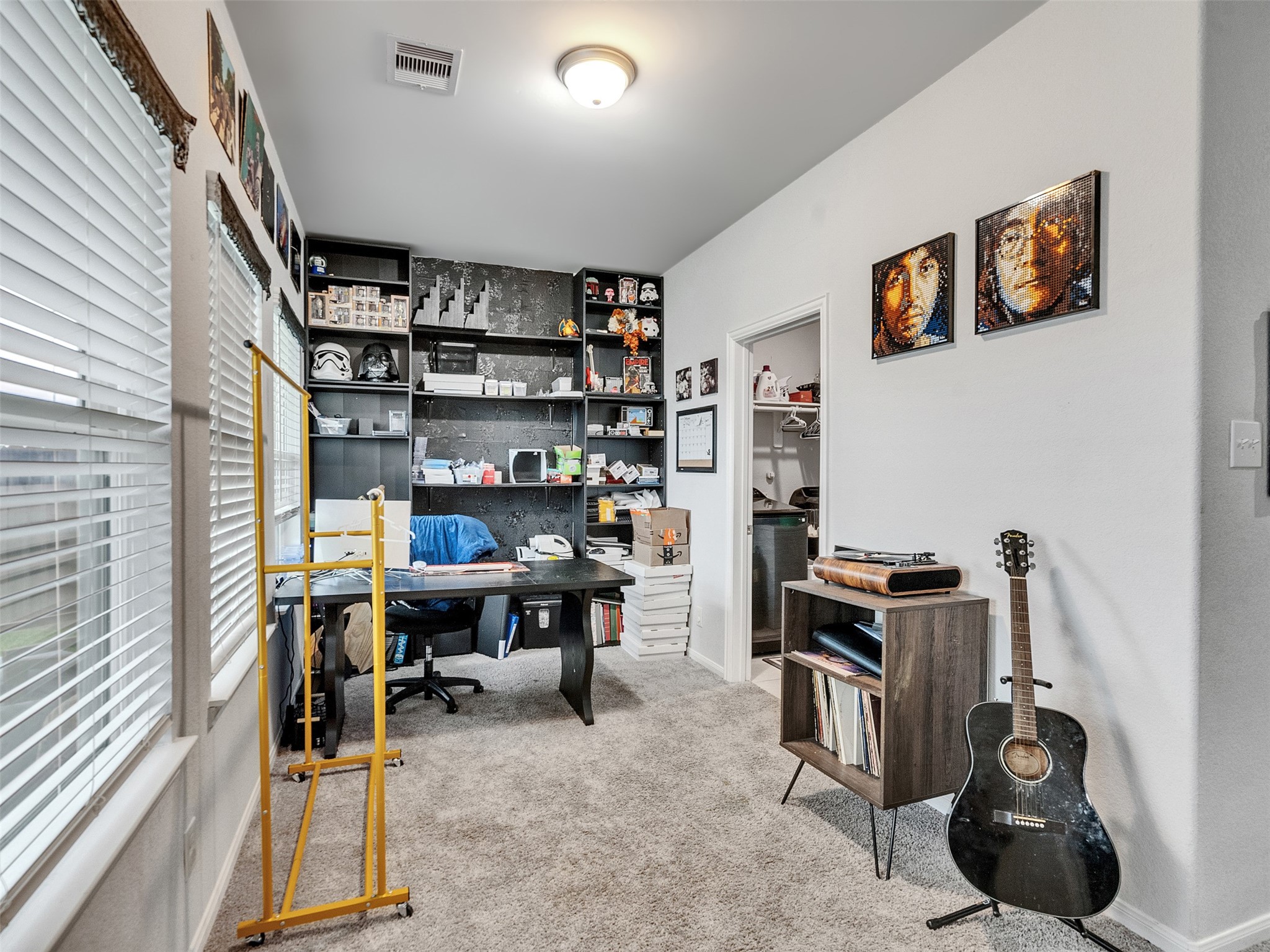 8719 Willet Street Baytown, TX 77521 - Photo 30 of 42 a view of a workspace with furniture