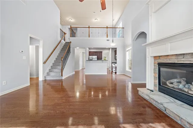 a view of livingroom with fireplace and wooden floor
