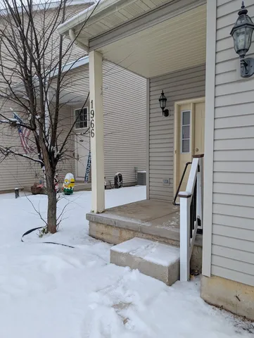 a bathroom with a glass door shower