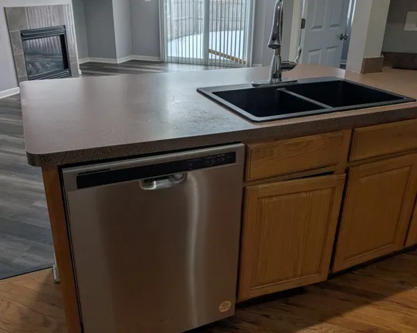 a close view of sink and microwave