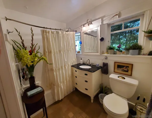 a front view of a house with wooden floor