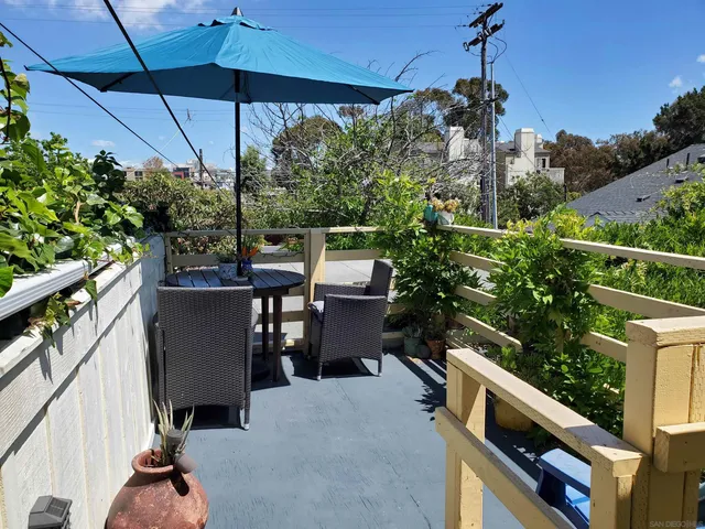 a bed room with a bed and a television