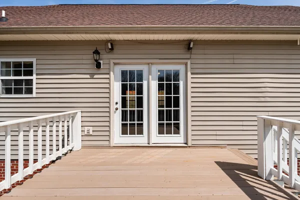 a balcony view with a seating space