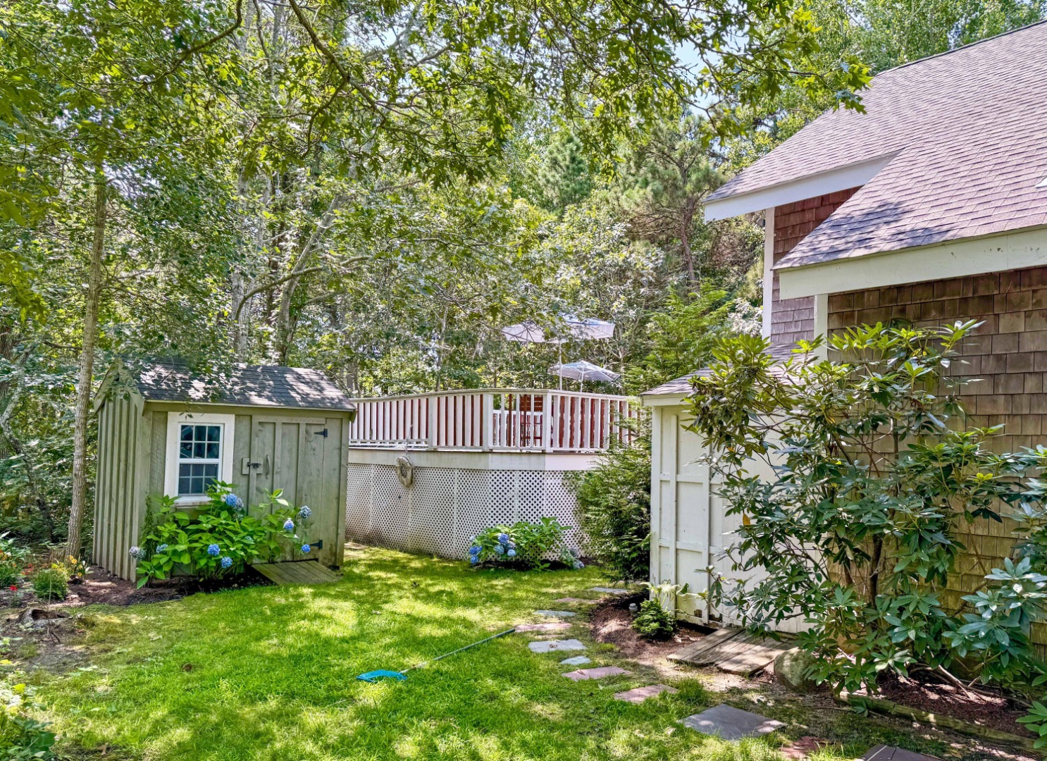 58 Rd To The Plaines Edgartown, MA 02539 - Photo 38 of 40 a view of a house with a yard and plants