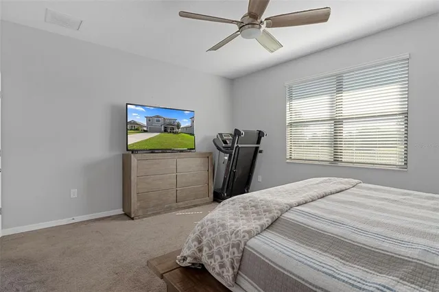 a picture of a bathroom with a shower