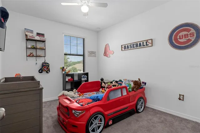an aerial view of a house with outdoor space