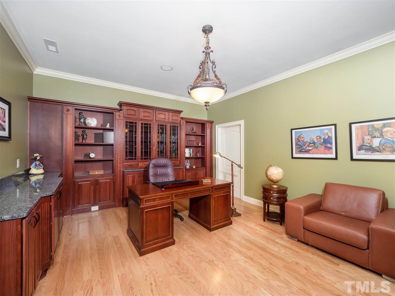 113 Bathgate Lane Cary, NC 27513 - Photo 17 of 30 Private office on lower level has custom built ins. Perfect for working from home!