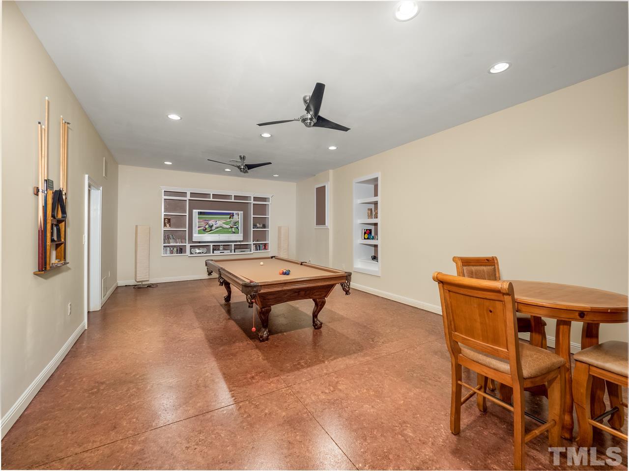 113 Bathgate Lane Cary, NC 27513 - Photo 18 of 30 Versatile recreation room has pool table and exercise equipment. Make it your own..yoga studio, ping pong..