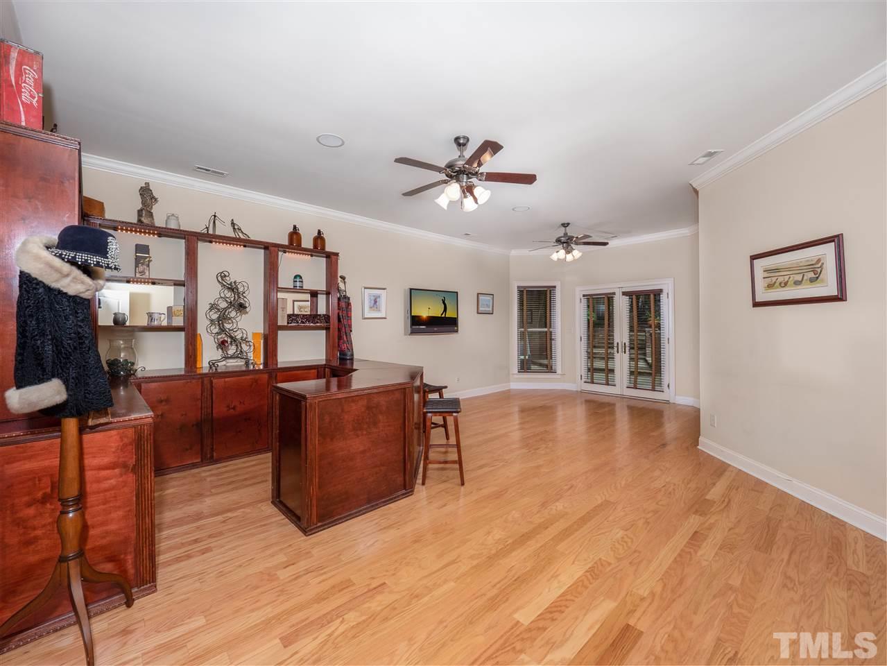 113 Bathgate Lane Cary, NC 27513 - Photo 19 of 30 Lower level bar can be a fun man cave! Great place to watch the game and entertain guests.