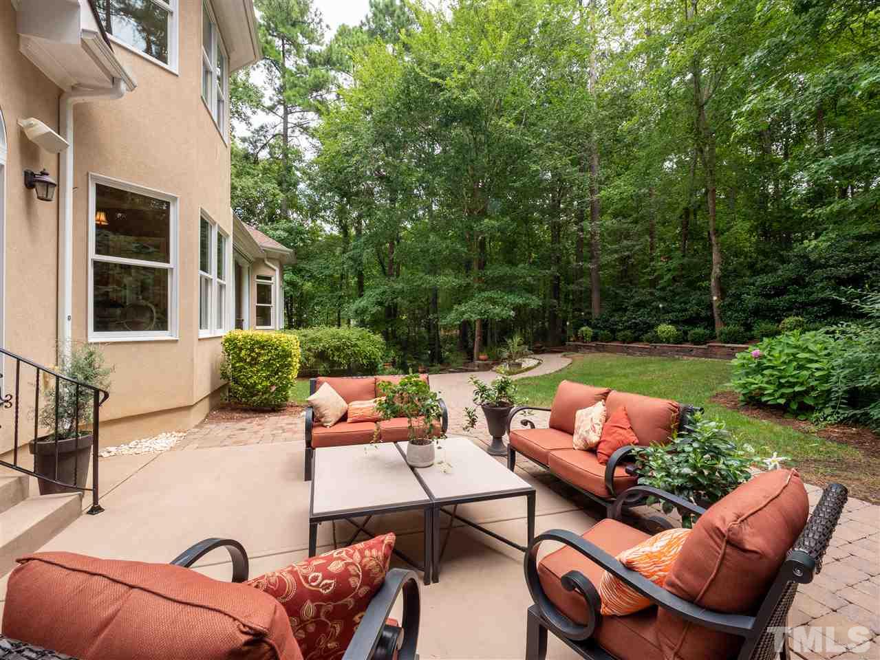 113 Bathgate Lane Cary, NC 27513 - Photo 27 of 30 Just one of many relaxing areas in the beautifully landscaped back yard.