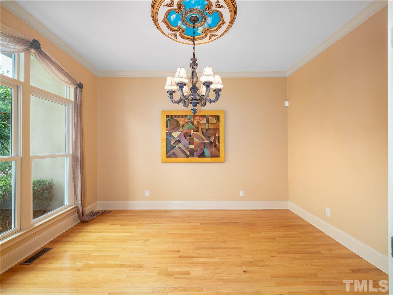 113 Bathgate Lane Cary, NC 27513 - Photo 5 of 30 Great space for after dining coffee or wine. Could also be an office.