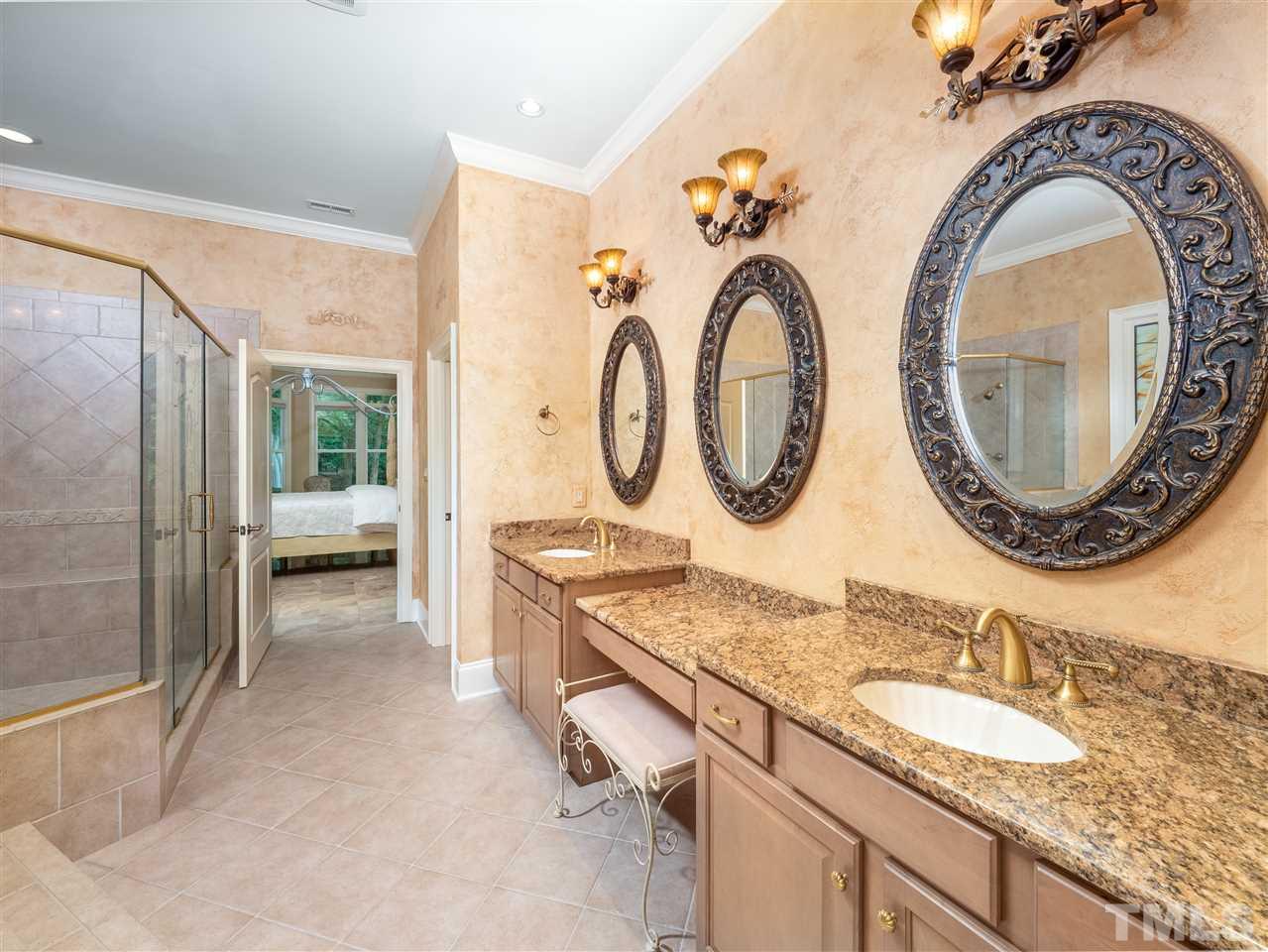 113 Bathgate Lane Cary, NC 27513 - Photo 7 of 30 Luxurious master bath opens to huge custom closet.