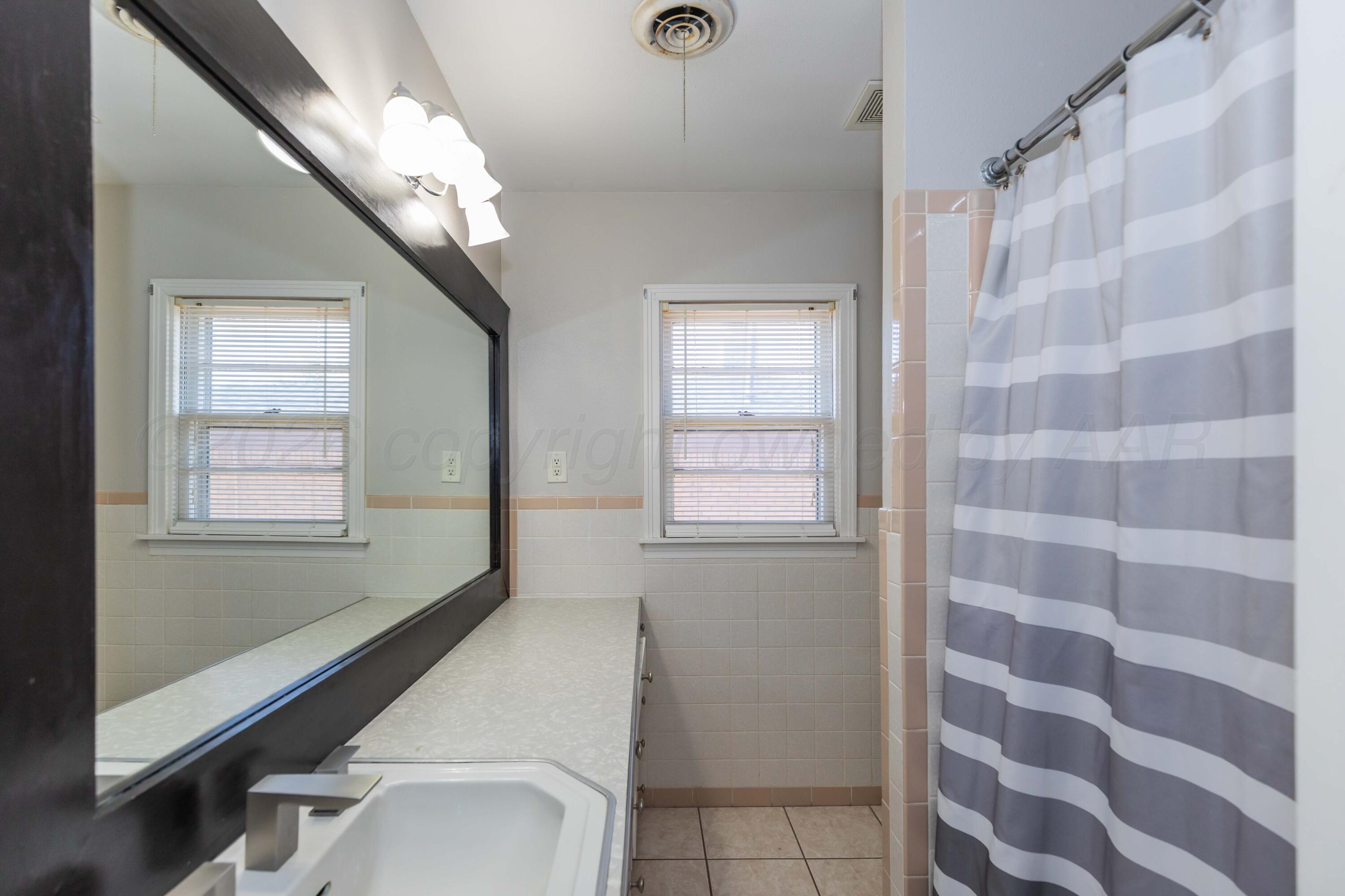 1602 Mustang Street Amarillo, TX 79102 - Photo 15 of 36 a very nice looking room with a large window