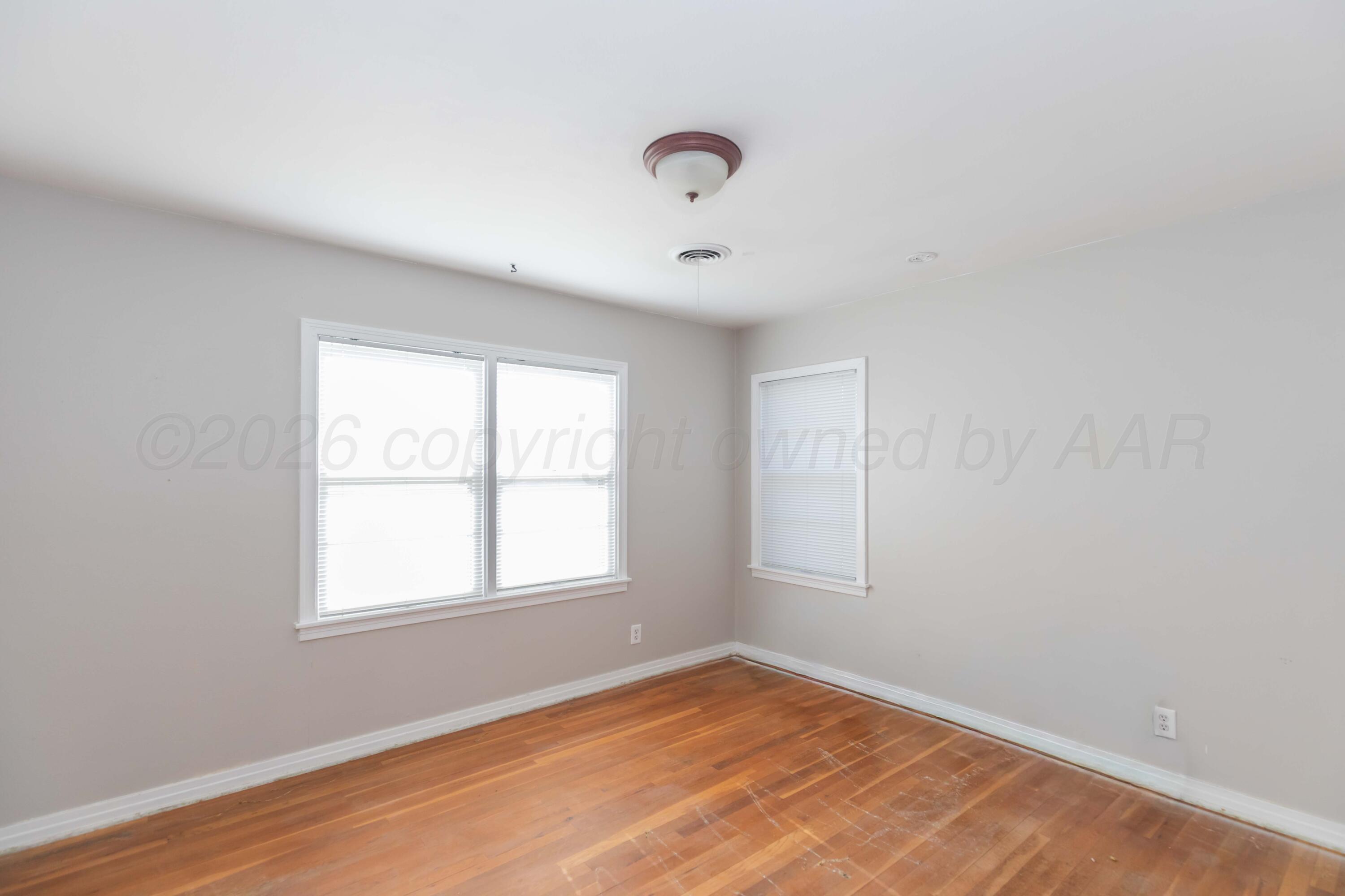 1602 Mustang Street Amarillo, TX 79102 - Photo 18 of 36 an empty room with a window